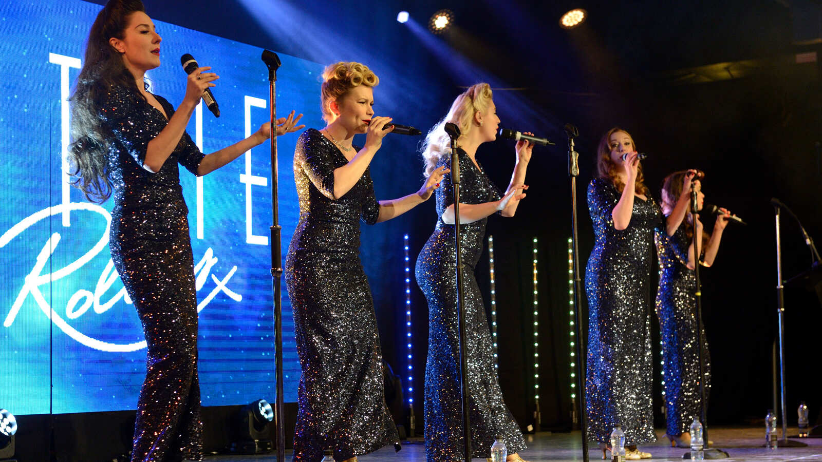 Five singers at glamorous awards event