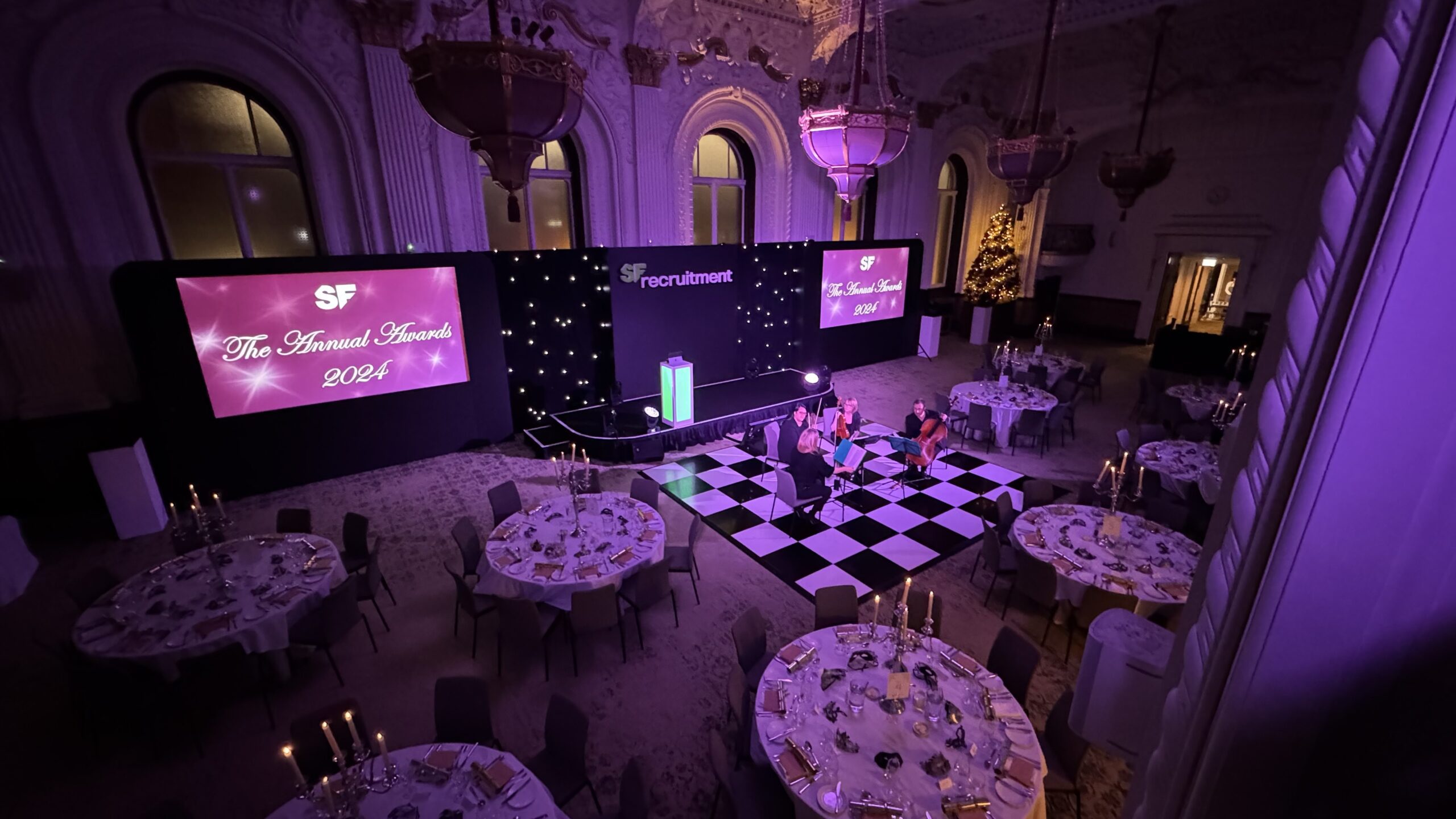 An event held at The Grand Hotel Birmingham for SF Recruitment, featuring a string quartet and tables set for dinner.