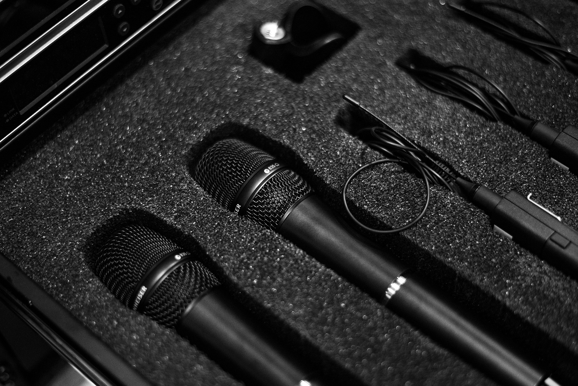 Microphones in a case - part of the AV hire equipment available from Quadrant Events